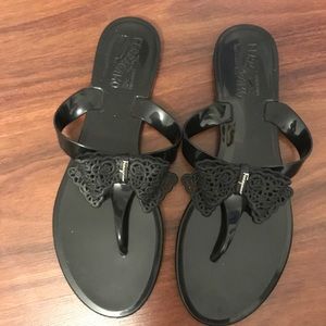 Authentic Ferragamo jelly bow sandals/black size9